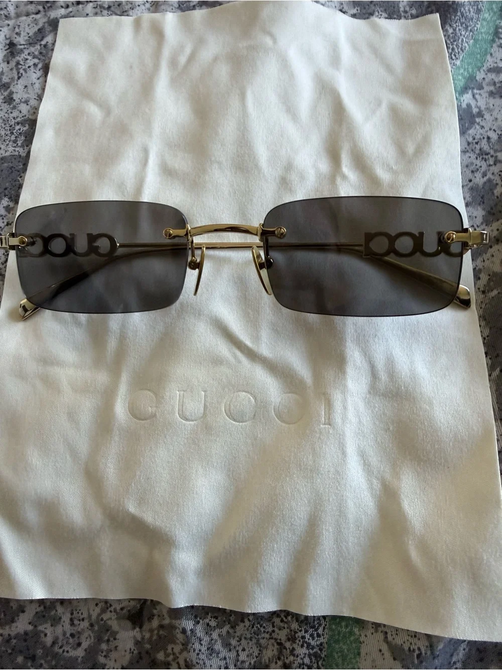 Gucci Gold Frame Sunglasses with Gray Lenses